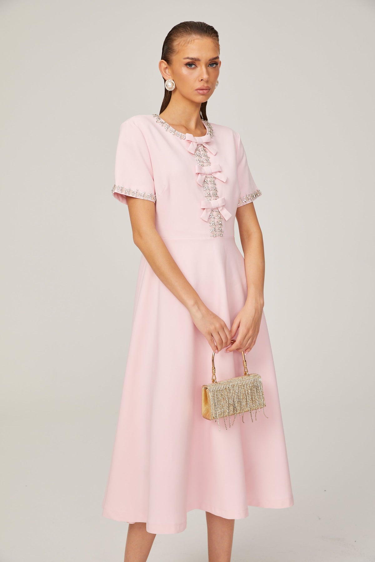 Cassi crystal-accented pink bow midi dress