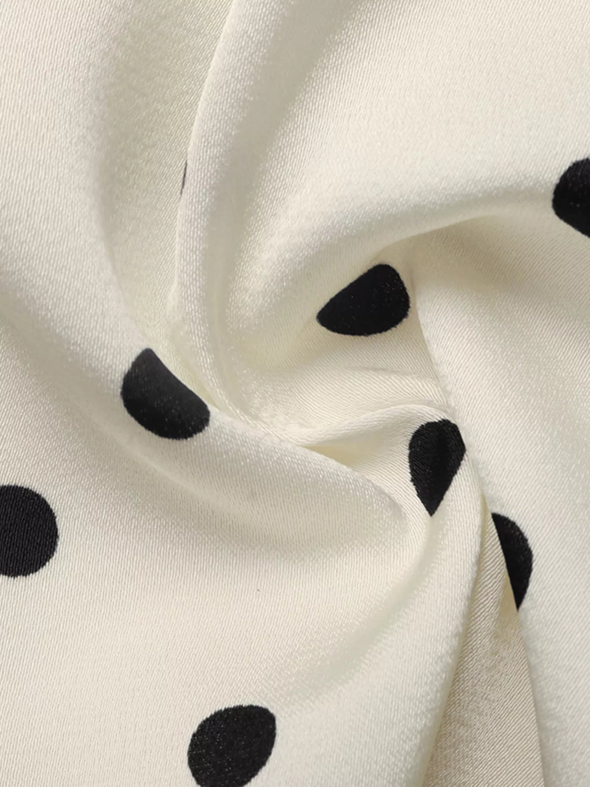 Polka Dot Sleeveless Peplum Blouse