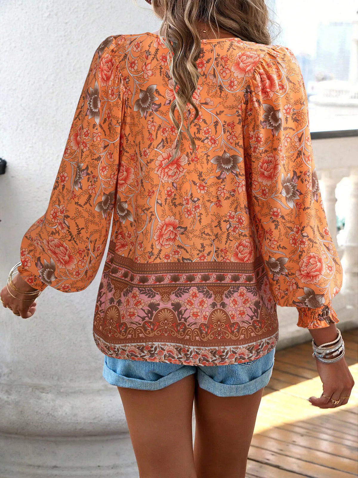 Floral Print Tie-Neck Blouse with Smocked Cuffs
