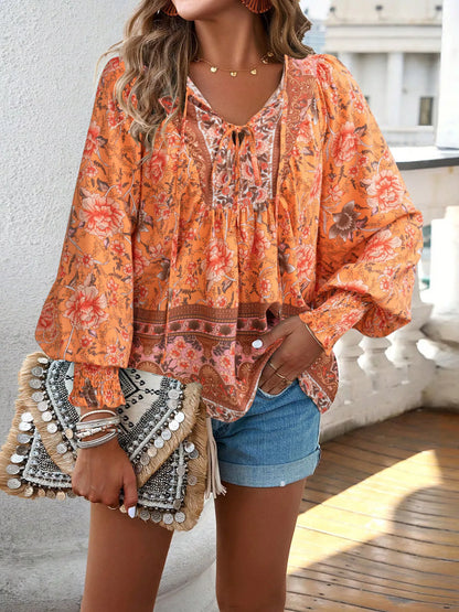 Floral Print Tie-Neck Blouse with Smocked Cuffs