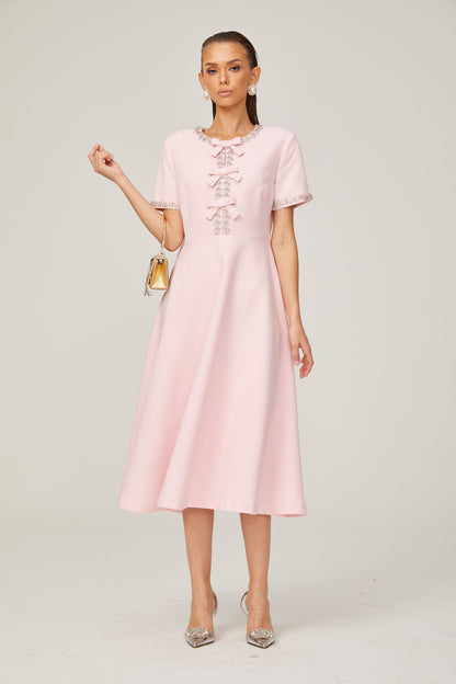 Cassi crystal-accented pink bow midi dress