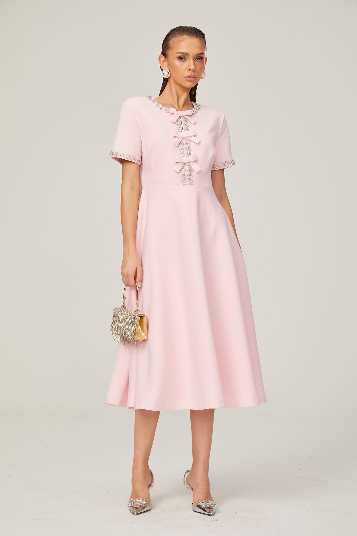 Cassi crystal-accented pink bow midi dress