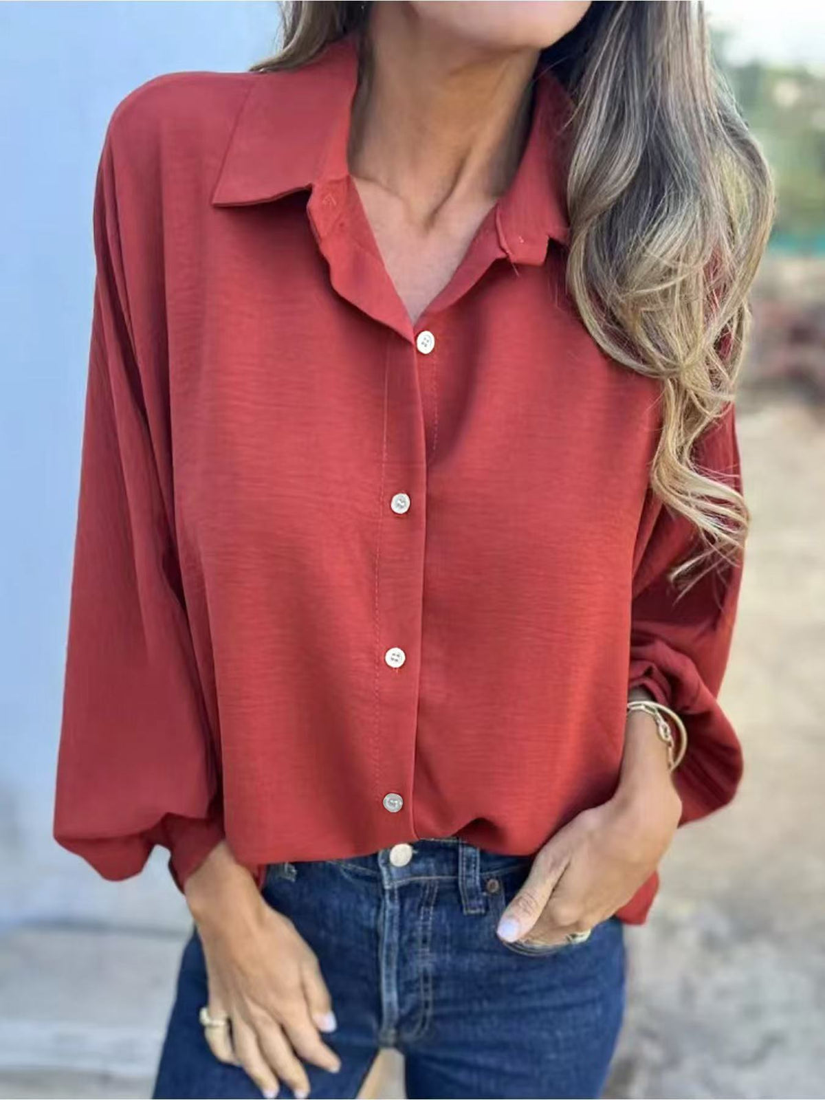 Elegant plain button-up shirt for women