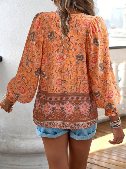 Floral Print Tie-Neck Blouse with Smocked Cuffs
